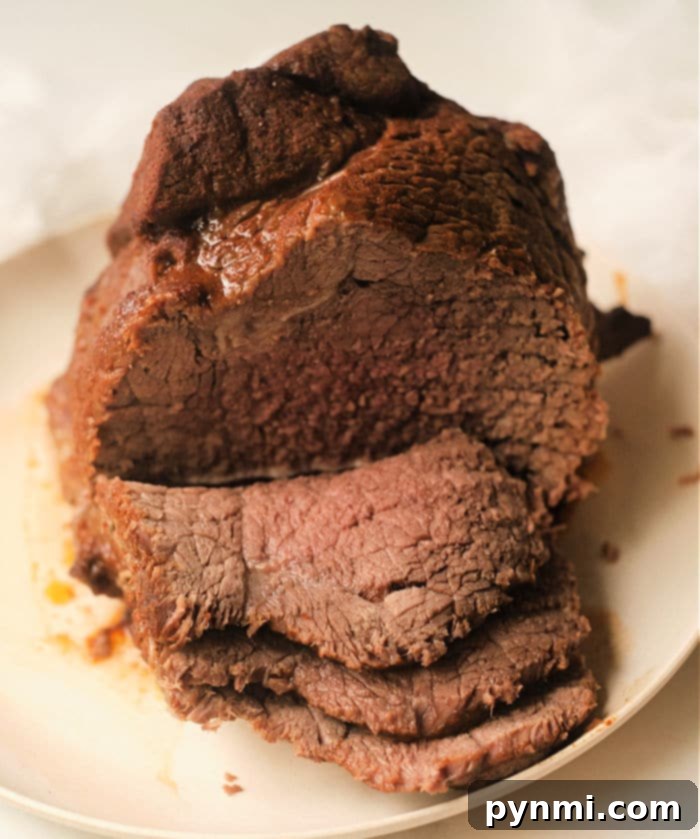 Perfectly cooked Mexican Pot Roast, tender and flavorful, ready to be served from a pressure cooker.