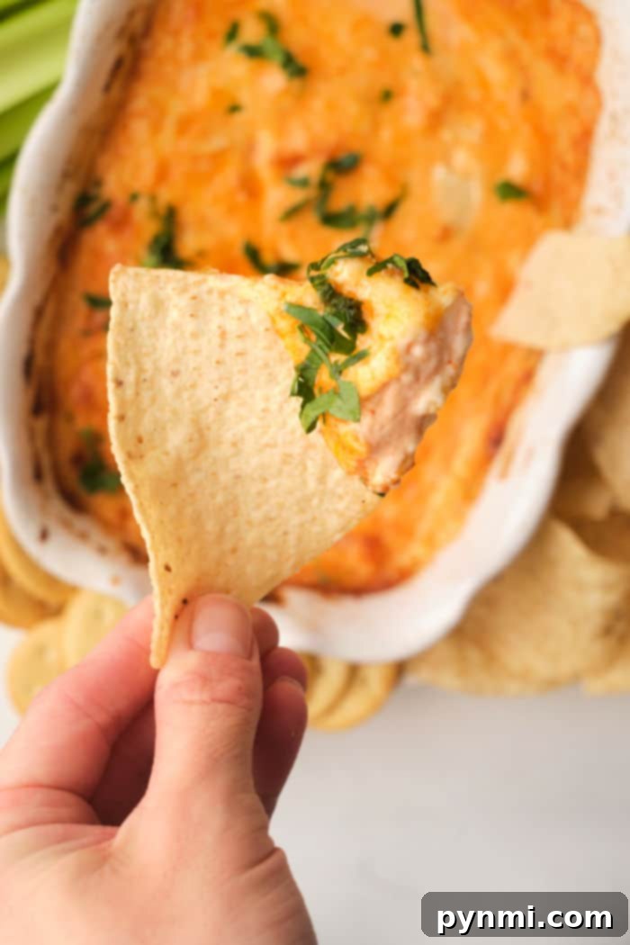 Creamy Dairy-Free Buffalo Chicken Dip, perfect for Super Bowl parties without cream cheese.