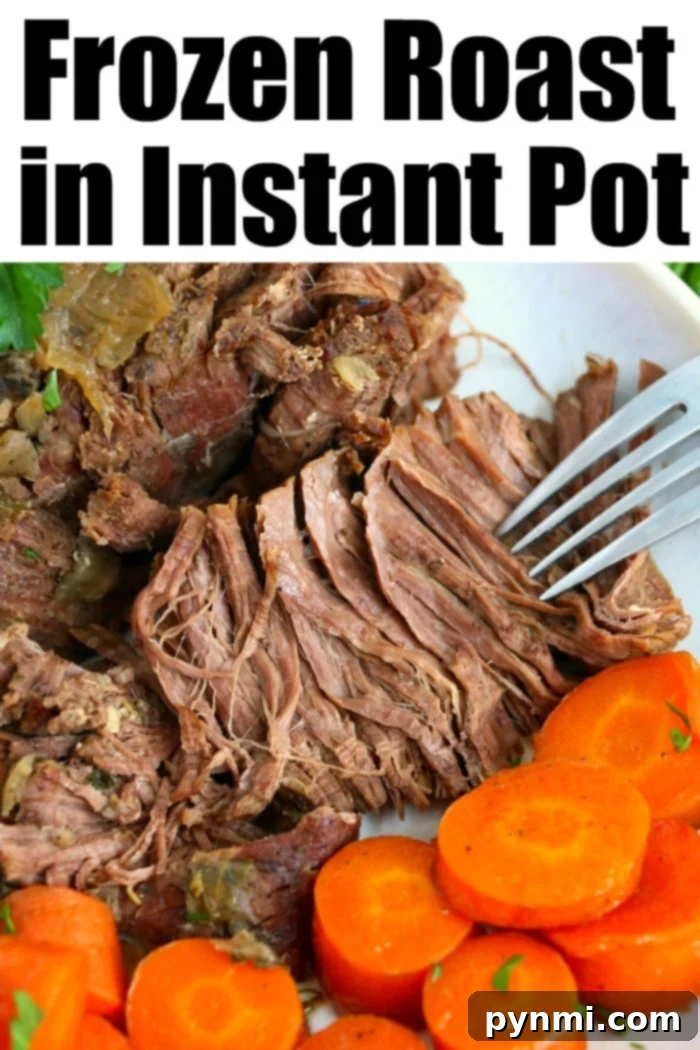 Mastering Tender Frozen Meat 4 Close-up of a plate with shredded roast beef and sliced carrots, garnished with herbs. A fork is shown pulling apart the tender meat, showcasing the ease of preparing a delicious frozen roast in an Instant Pot.