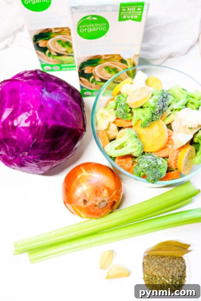 Vibrant Slow Cooker Purple Cabbage Soup 4 A close-up shot of steaming red cabbage soup in a bowl, showing tender purple cabbage pieces, carrot slices, and fresh herbs, inviting warmth and flavor.