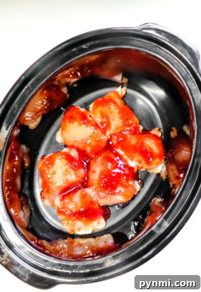 Crockpot BBQ Chicken, perfectly glazed and ready to be enjoyed.