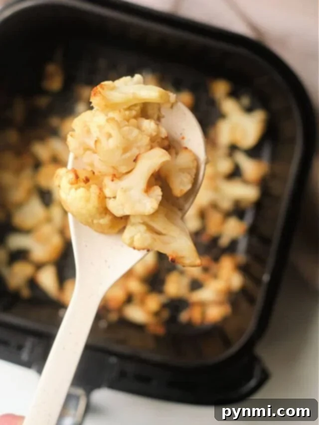 Golden Crispy Air-Fried Frozen Vegetables 4 Air-Fryer-Frozen-Cauliflower florets perfectly cooked