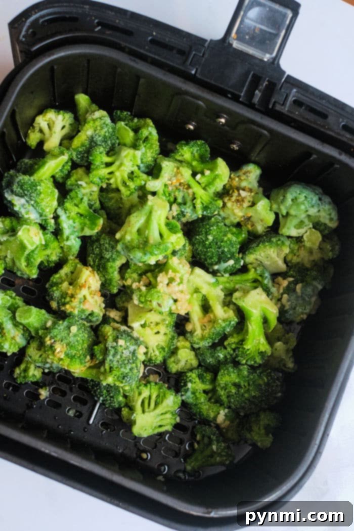 Golden Crispy Air-Fried Frozen Vegetables 6 Frozen Broccoli in air fryer basket