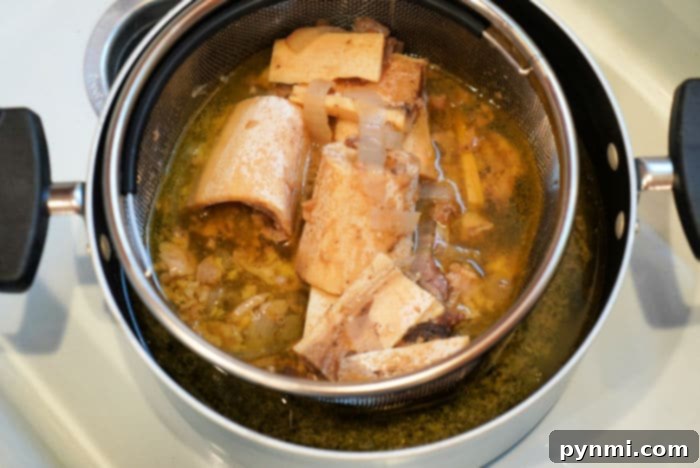 Cooked bone marrow, extracted from the bone, showcasing its creamy texture.