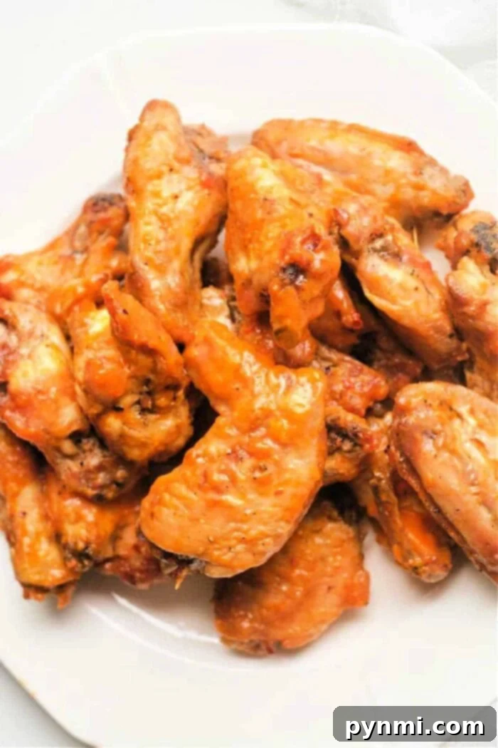 baked-frozen-chicken-wings on a wire rack cooling