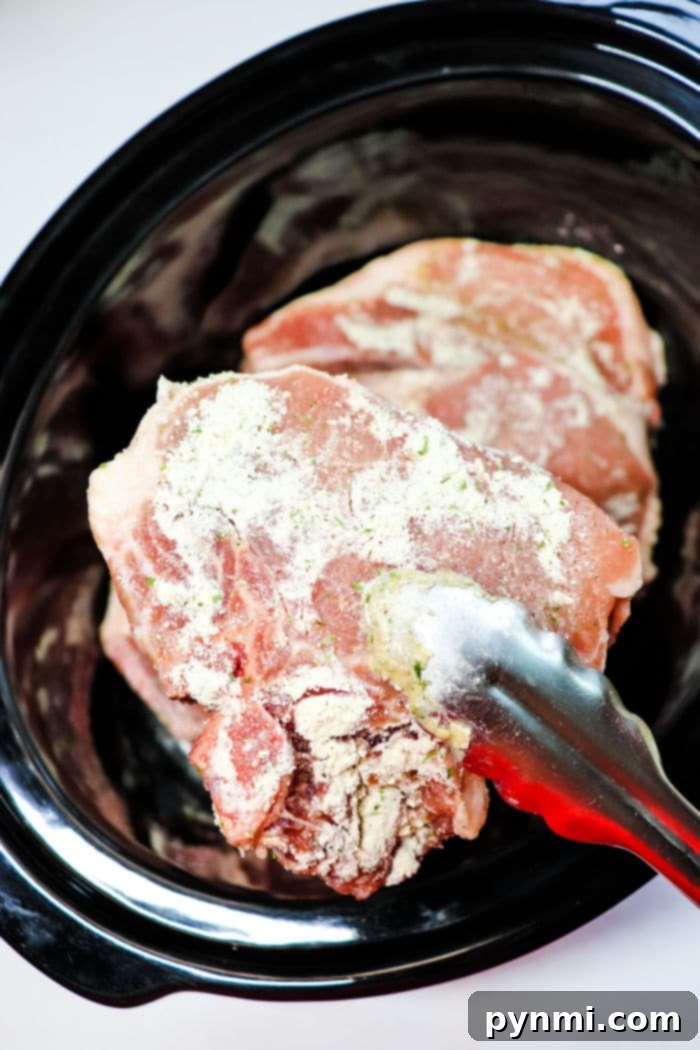 Ultimate Slow Cooker Ranch Pork Chops 5 Slow cooker ranch pork chops, perfectly cooked and tender.