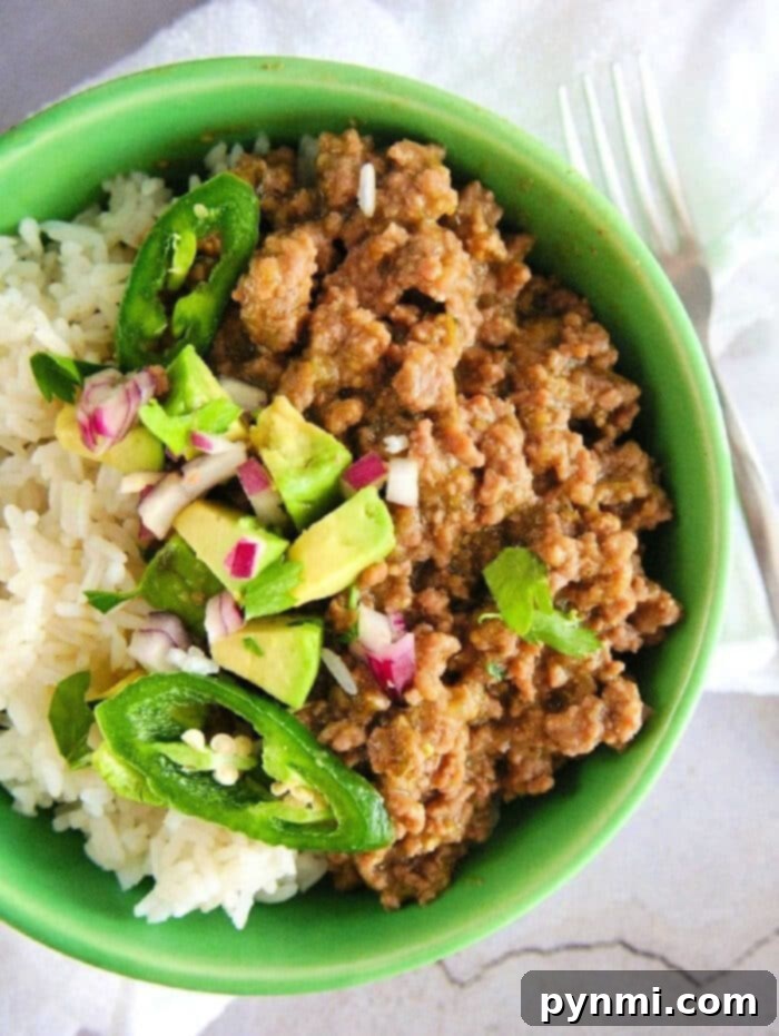 Mouthwatering Slow Cooker Taco Meat 2 Delicious slow cooker taco meat ready to be served in a Crockpot, perfect for a large gathering.