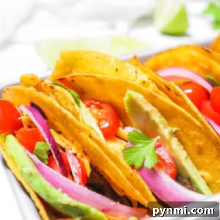 Mouthwatering Slow Cooker Taco Meat 10 Close-up of savory taco meat simmering in a crockpot, showcasing its rich texture and spices.