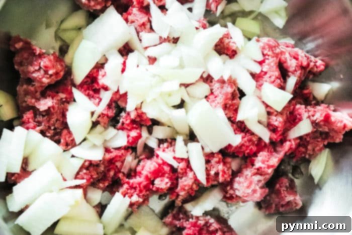 Mouthwatering Slow Cooker Taco Meat 5 Taco meat simmering perfectly in a slow cooker, ready for a delicious meal.