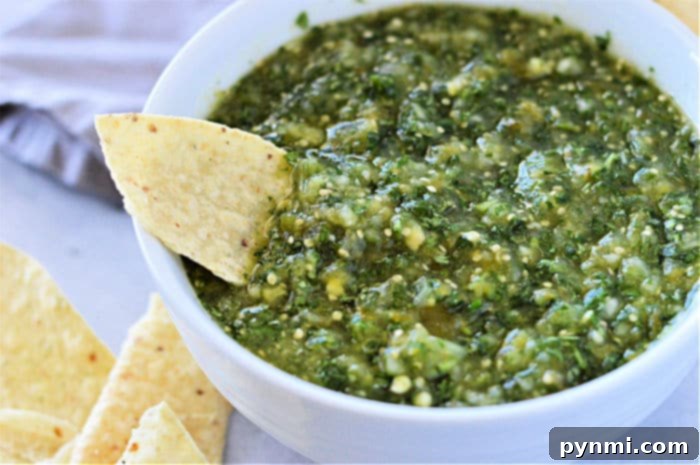 A bowl of freshly made green salsa verde, vibrant and ready for tasting.