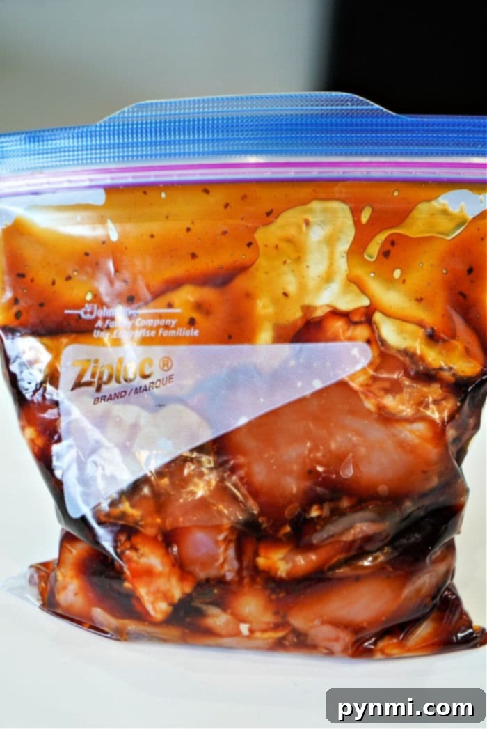 Teriyaki Chicken Thighs glazed with homemade sauce and garnished with sesame seeds.