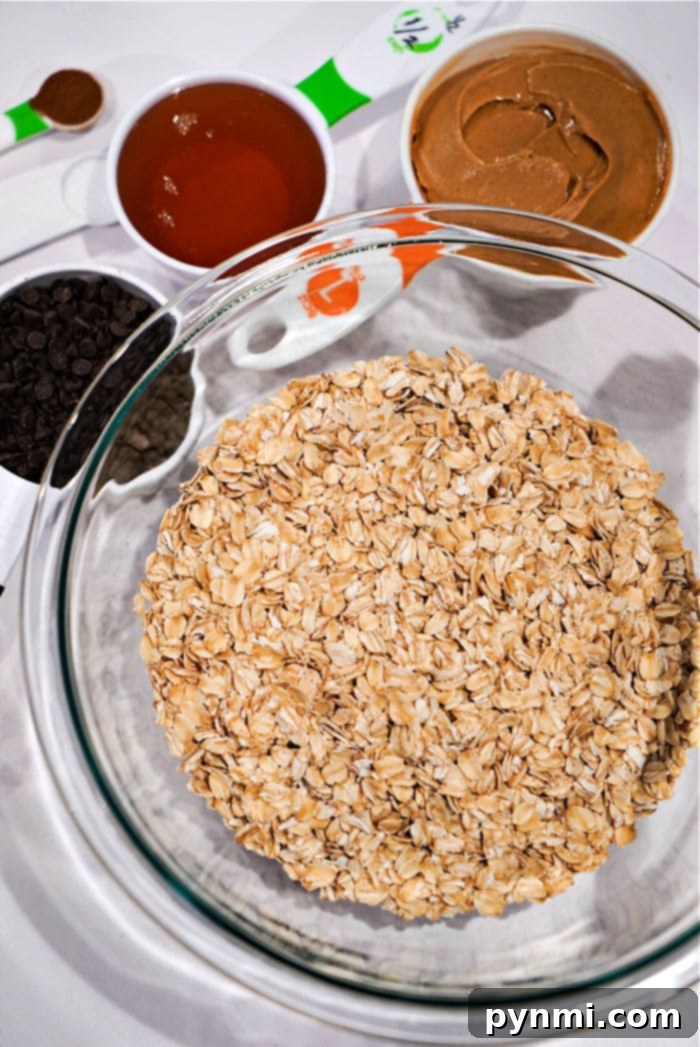 Viral TikTok Oatmeal Bars 3 Overhead shot of no-bake oatmeal bars cut into squares