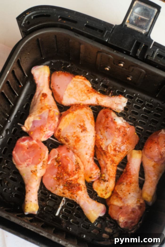 Naked Air Fryer Chicken 7 Crispy air fryer chicken drumsticks, seasoned to perfection.