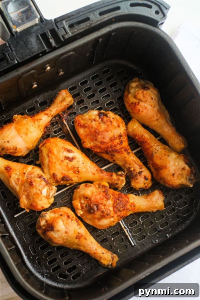 Naked Air Fryer Chicken 8 Crispy and golden air fryer chicken legs without breading, perfectly cooked.