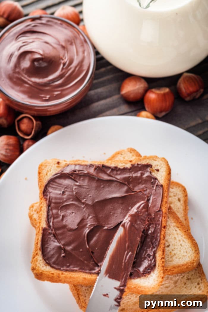 A basket overflowing with perfectly toasted bread slices, ready to be served.