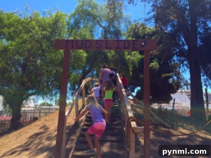 Things for kids to do in the summer. Kids playing on the beach, building sandcastles, perfect for summer activities for kids