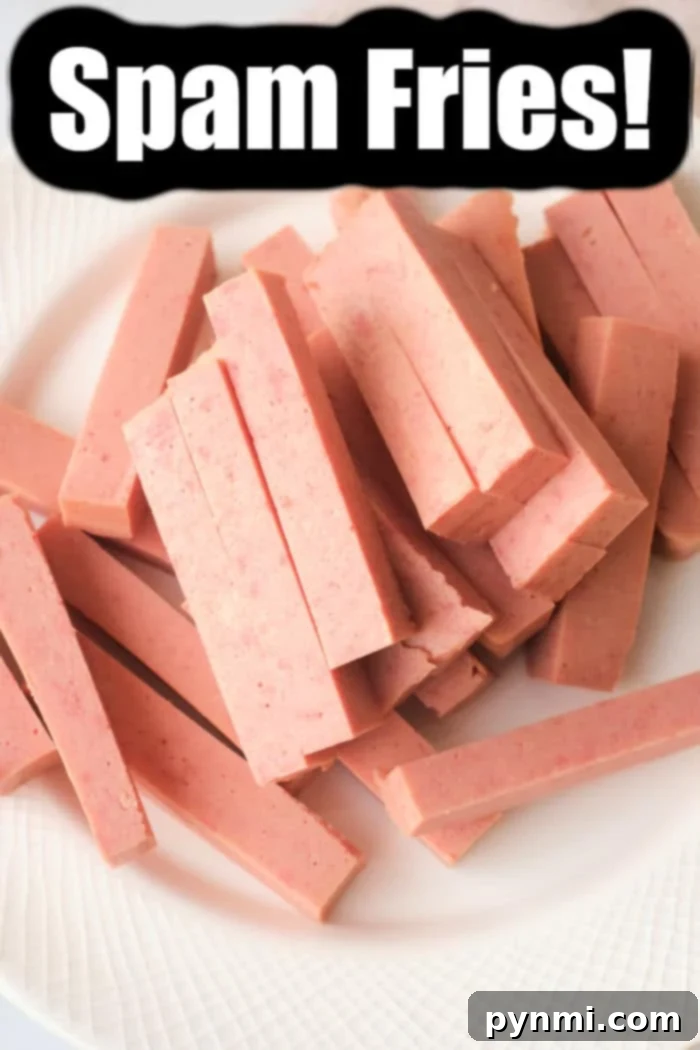 Crispy Air Fryer Spam Fries 5 Sliced Spam ready for air frying on a cutting board