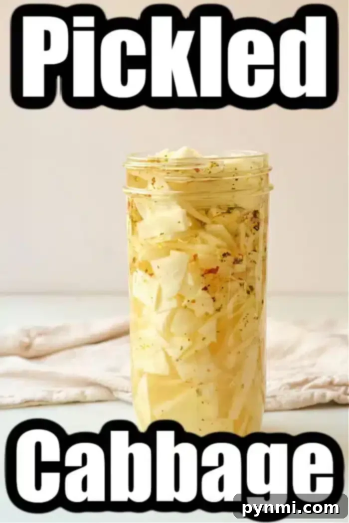 Zesty Quick Cabbage Pickle 4 A clear glass mason jar of quick pickled cabbage sits on a light surface. The jar is packed with thinly sliced cabbage in a yellowish brine, containing visible herbs and spices. The words "Quick Pickled Cabbage" are prominently displayed above and below the image. A soft, textured cloth is partially visible in the background, adding a touch of rustic charm to the scene.
