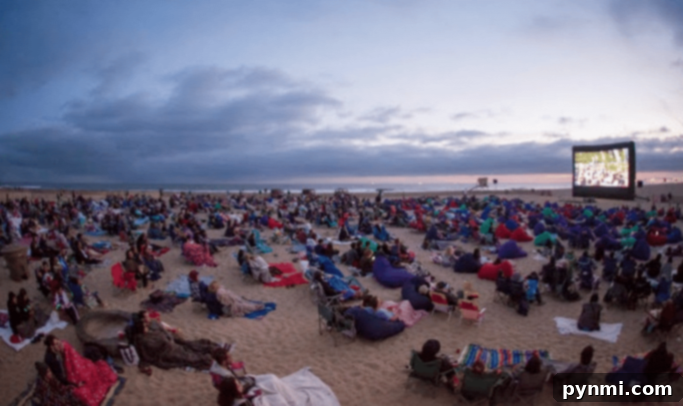 Your Ultimate Southern California Family Fun Guide 6 Families enjoying a beachfront cinema experience in Huntington Beach, Southern California