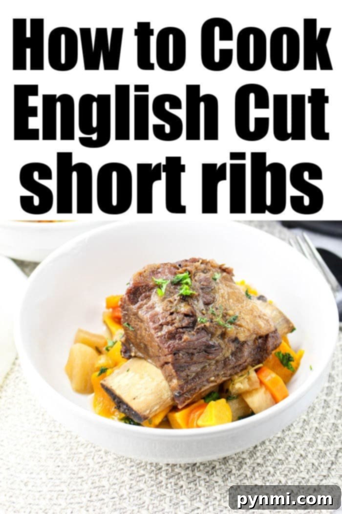 Platter of perfectly cooked, rich English cut short ribs with a savory sauce, ready to be served.