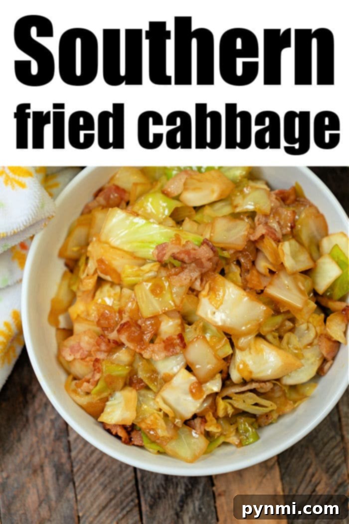 A serving of Southern Fried Cabbage, garnished with fresh herbs