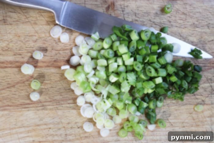 Lawson Inspired Homemade Chip Dip 4 Freshly chopped green onions, ready to be used as a garnish or folded into the dip.