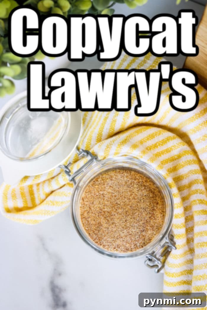 A glass jar filled with a seasoning blend sits on a white surface with a yellow striped cloth underneath. Above the jar, text reads 