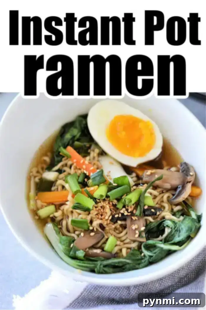 Easy Instant Pot Ramen 2 A bowl of Instant Pot Vegetable Ramen, topped with a halved soft-boiled egg, green onions, mushrooms, carrots, and greens. The image showcases text at the top reading "Instant Pot ramen.