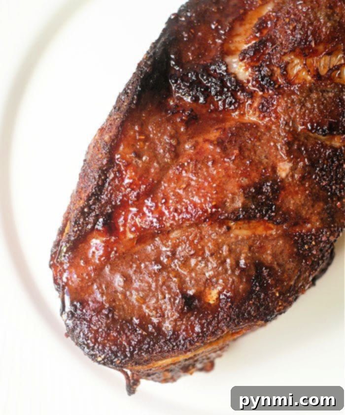 Ultimate Ninja Foodi Pork Dishes 2 Close-up of a perfectly tender air fryer pork roast.