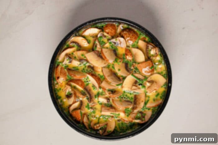 Pressure Cooker Quiche Perfection 5 Sliced mushrooms and herbs mixed into a beaten egg mixture for Instant Pot Quiche.