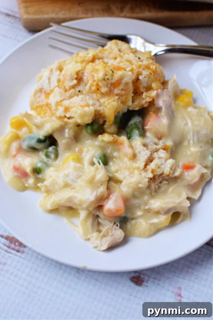 A slice of chicken pot pie with Red Lobster biscuit topping.