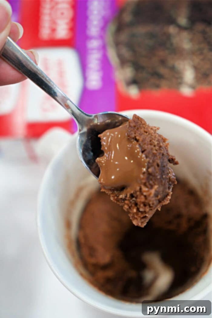 Lava Cake Bliss: Single-Serving Indulgence 5 Ingredients for lava cake in a mug: cake mix, chocolate, and Greek yogurt.