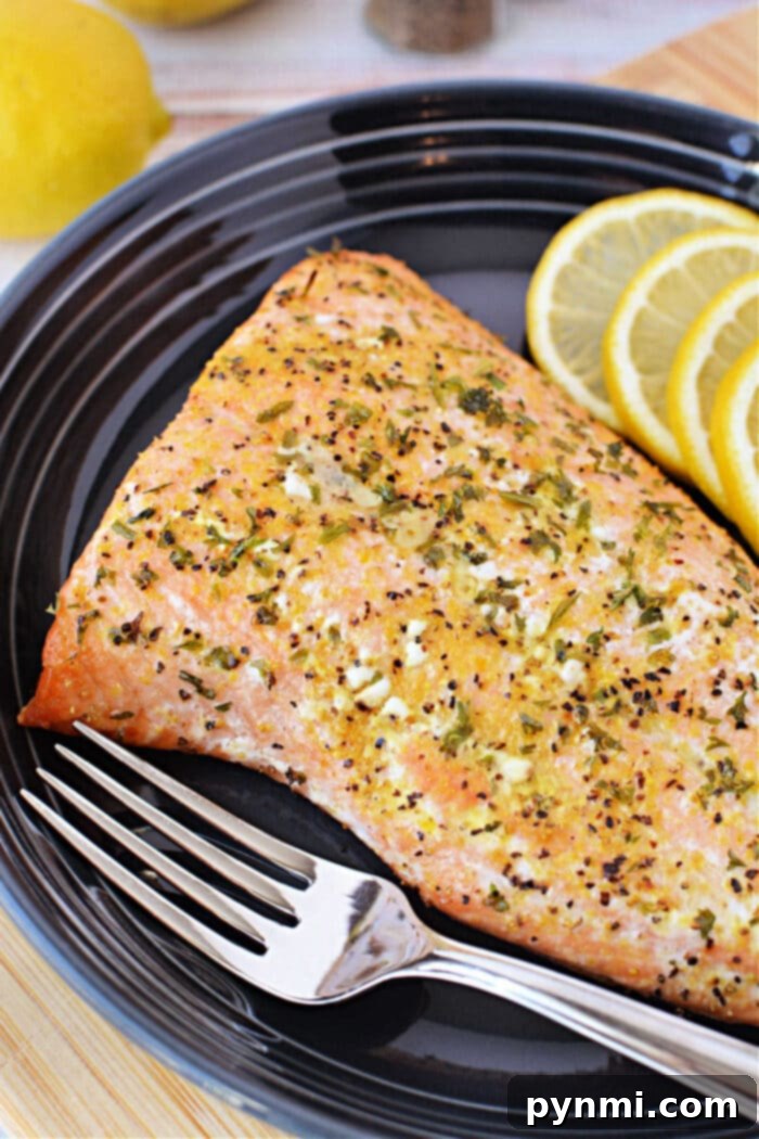 Perfectly baked frozen salmon fillet with lemon slices