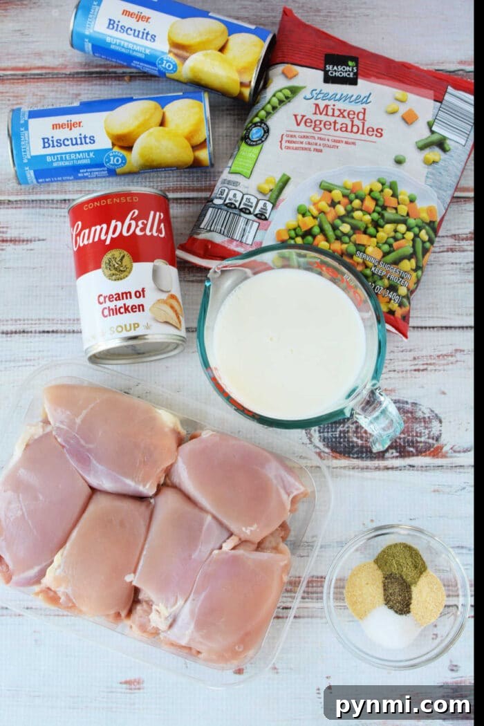 Slow-Cooker Chicken Pot Pie Casserole Recipe 3 Ingredients for a Chicken Pot Pie casserole: biscuits, frozen mixed vegetables, cream of chicken soup, milk, chicken, and spices—perfect for baking or making in your Crockpot.